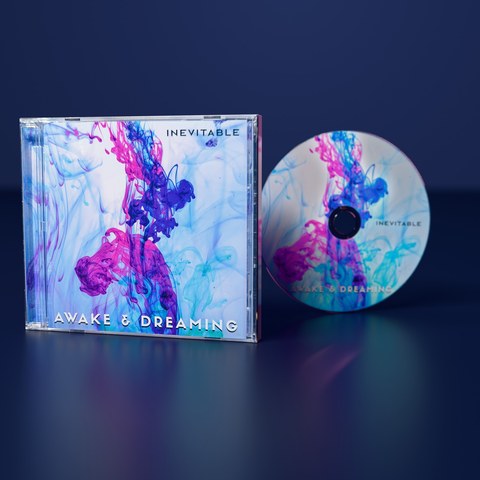 Inevitable CD in its jewel case beside the printed disc