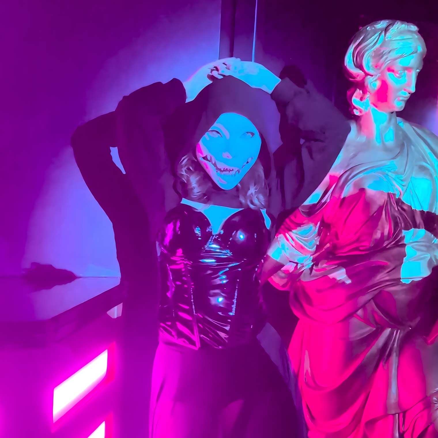 Awake & Dreaming Antidote mask neon classical statue seductive dark