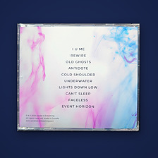 Inevitable CD jewel case back with the ten-song tracklist